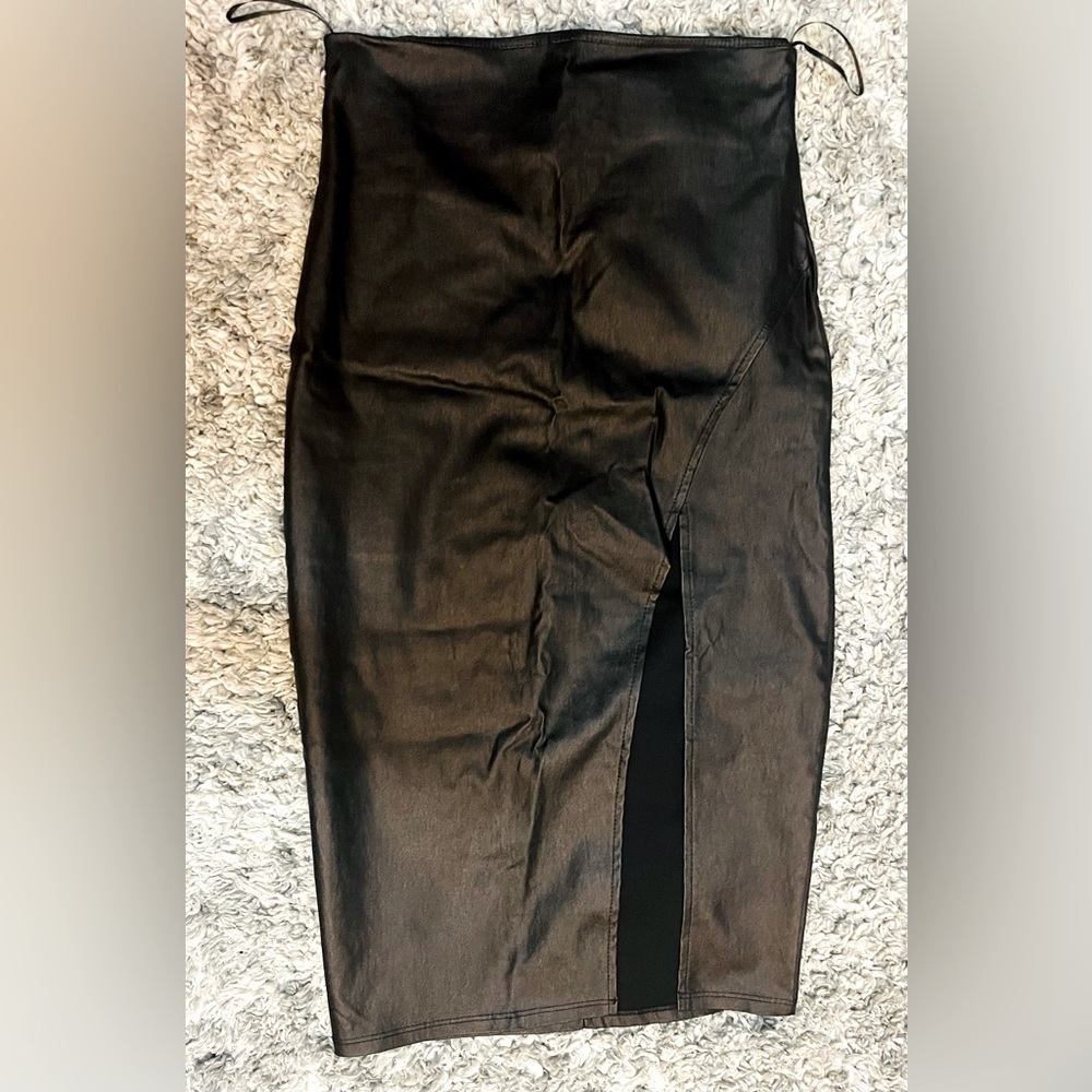 Pencil Skirt - black in color and Medium in size.